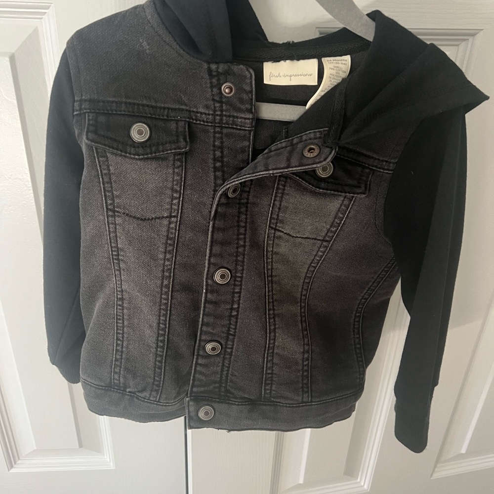 Black with some fade jean jacket. 24 month true to size
